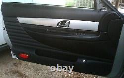 2002-2005 Ford Thunderbird Left Interior Door Trim Panel (Aluminum/Black 2FAZA)