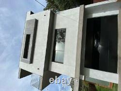 Modern Black Smooth Flush Panel Steel Garage Door & Horizontal Glass 10' x 8